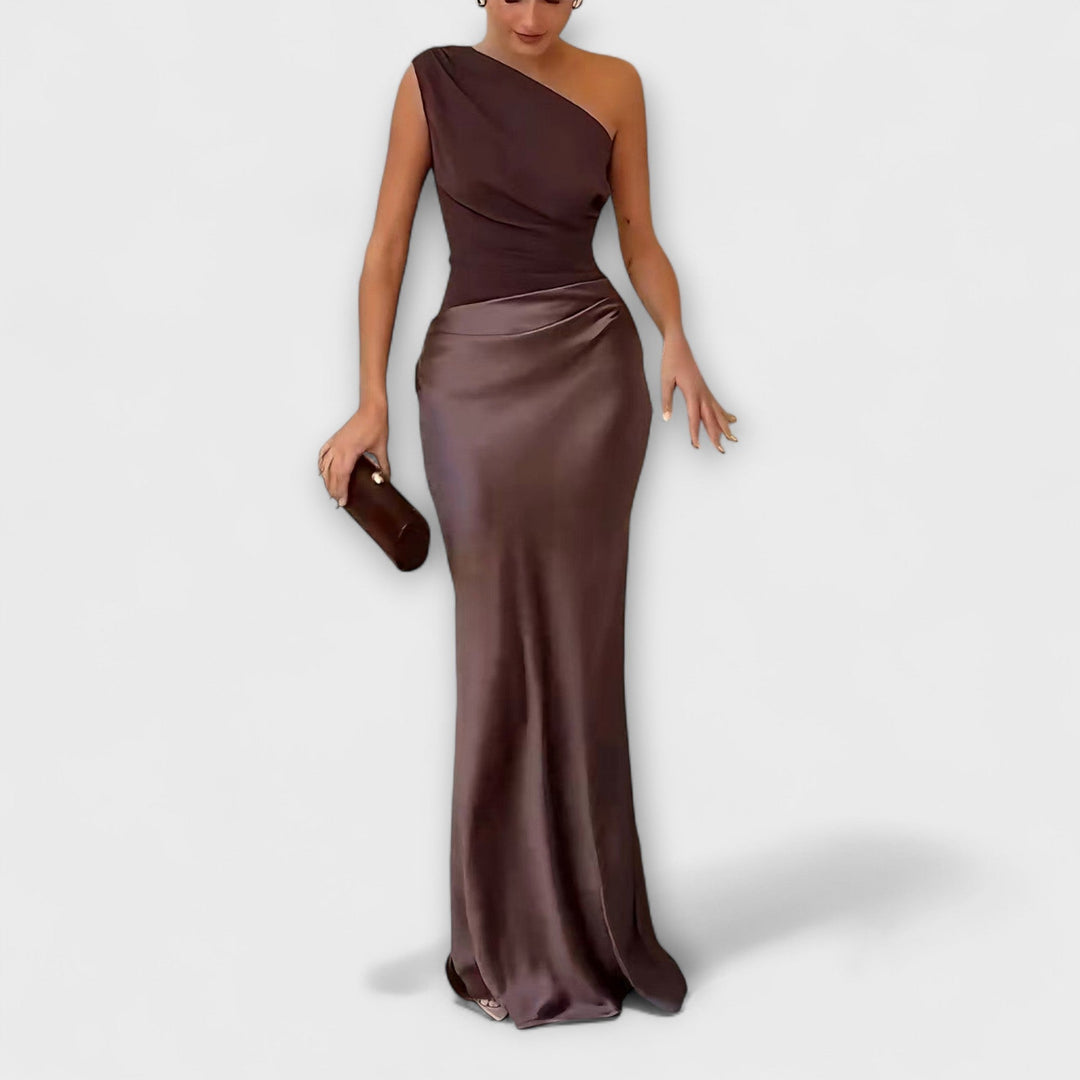 Elegante vestido maxi plissado com um ombro só.