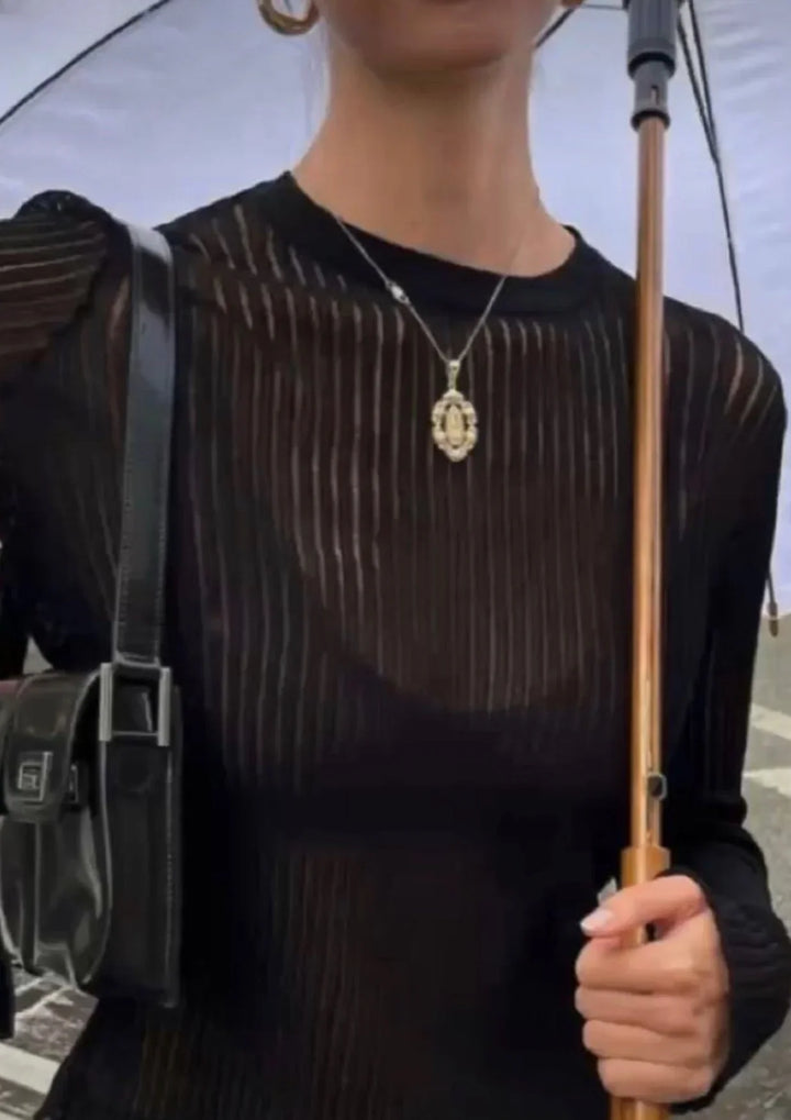 Erika Transparente Wool Sweater