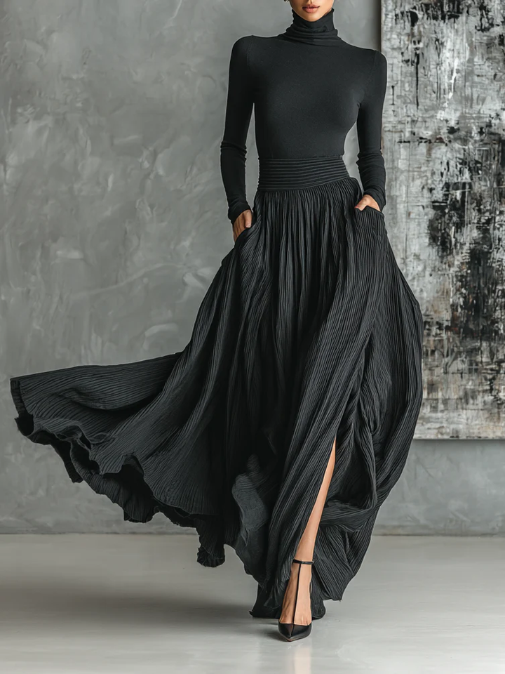Marion | Conjunto Preto com Gola Alta e Saia Plissada Elegante