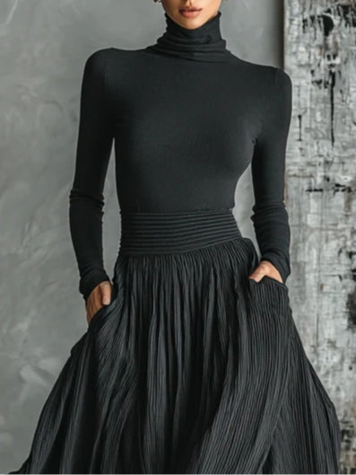 Marion | Conjunto Preto com Gola Alta e Saia Plissada Elegante