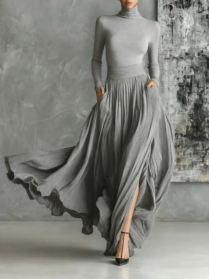 Marion | Conjunto Preto com Gola Alta e Saia Plissada Elegante