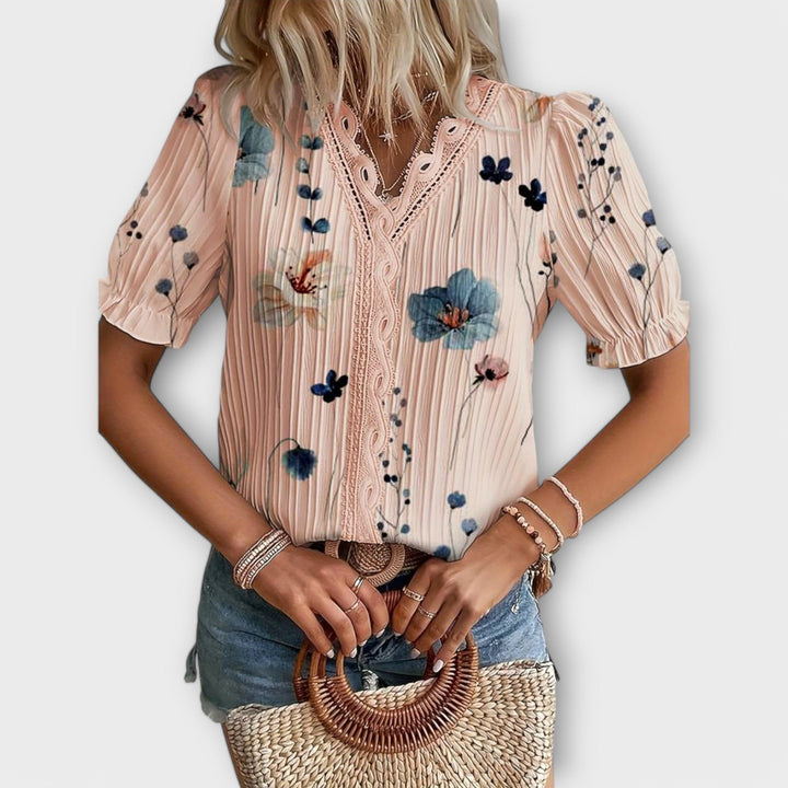 Emília - Blusa com decote em V